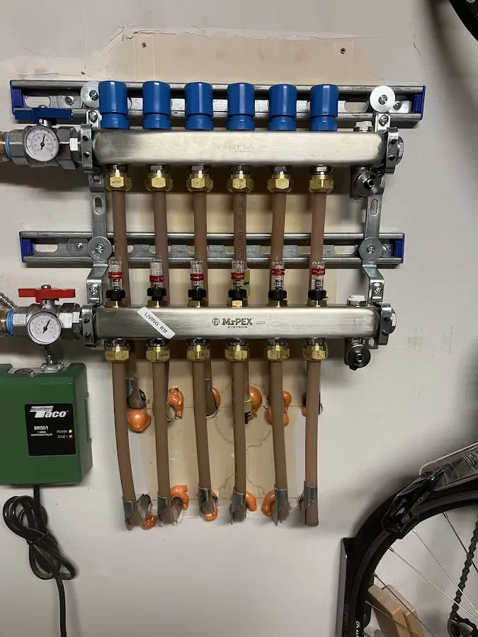 Plumber performing Water Heater Repair at a residential property in Stroud